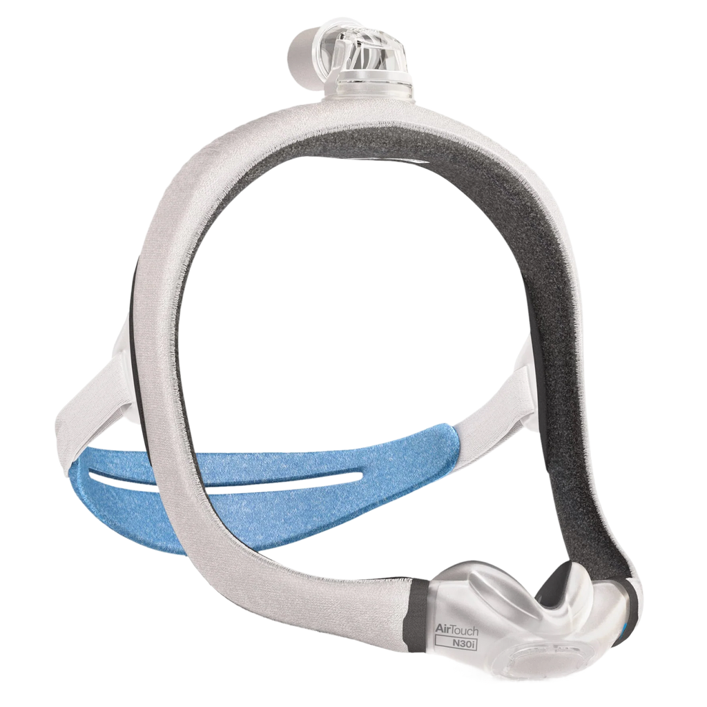 ResMed AirTouch N30i nasal CPAP mask with a top-of-head tube connection, soft memory foam cushion, and fabric-wrapped headgear with blue accents.