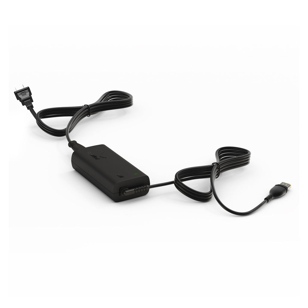 ResMed AirSense 11 power supply, a black rectangular adapter with an attached power cord and a green indicator light.