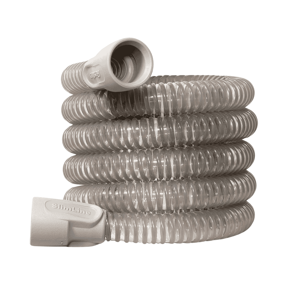 ResMed SlimLine CPAP tubing, coiled clear corrugated hose with white connectors on green background